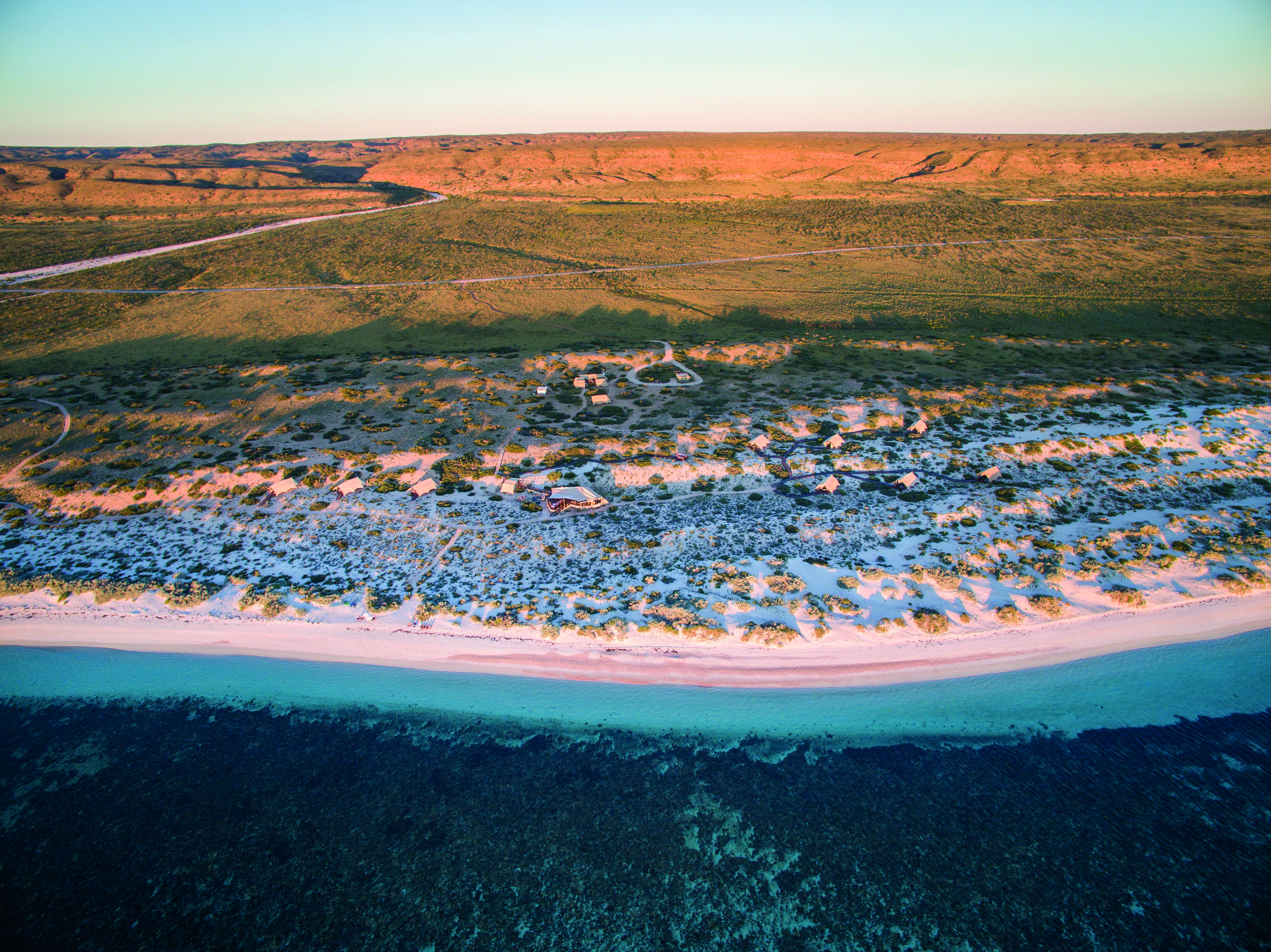 Sal Salis aerial view with sea and sand shown
