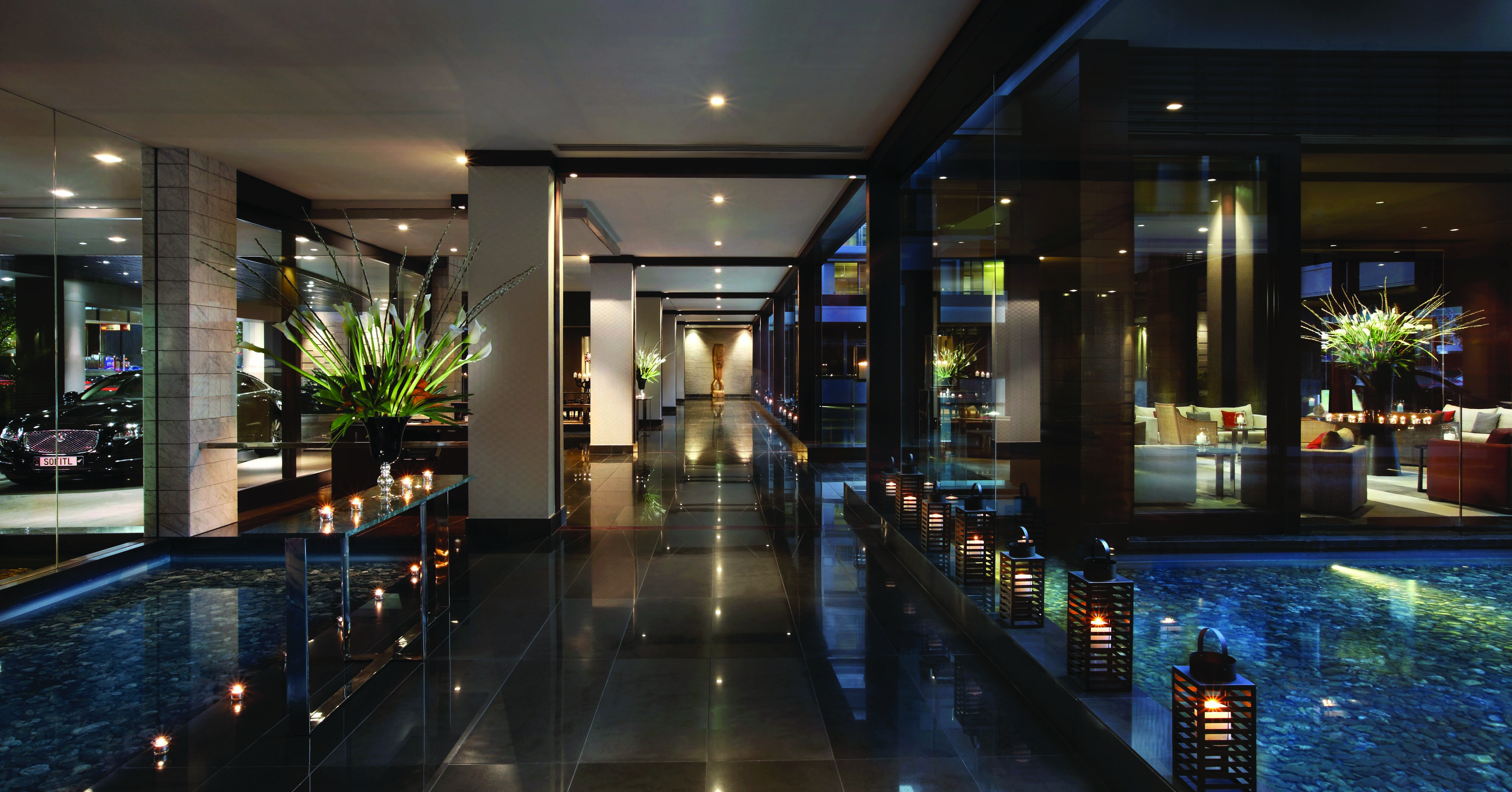 Sofitel Viaduct Auckland Harbour lobby with marble floors and lanterns and mosaics on the floor