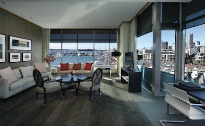 Sofitel Viaduct Auckland Harbour prestige lounge with sofas and chairs and marina view