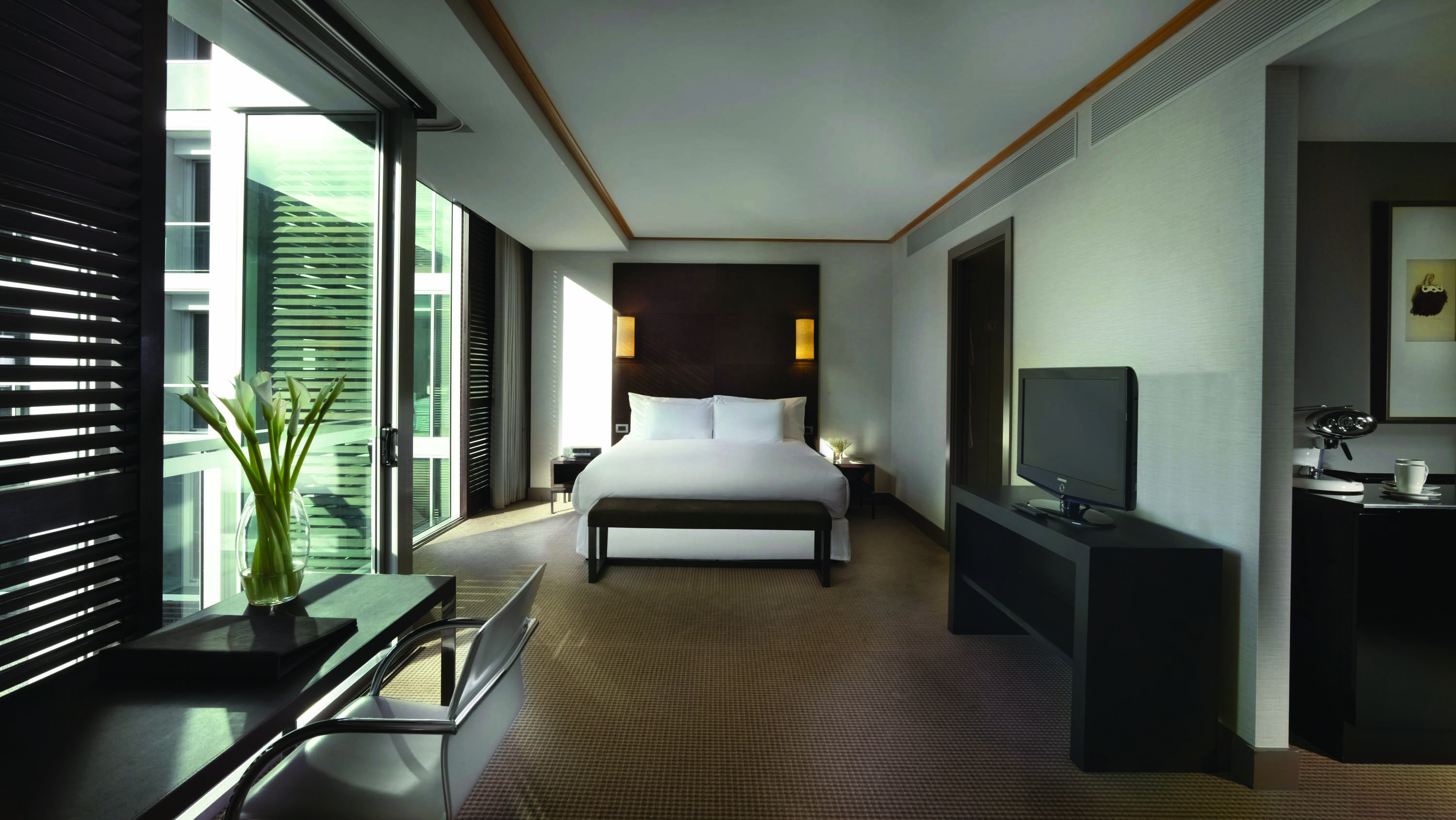 Sofitel Viaduct Auckland Harbour superior room bedroom with floor to ceiling windows 