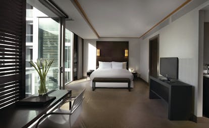 Sofitel Viaduct Auckland Harbour superior room bedroom with floor to ceiling windows 