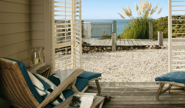 The Boatshed Waiheke Island Auckland beach terrace with loungers