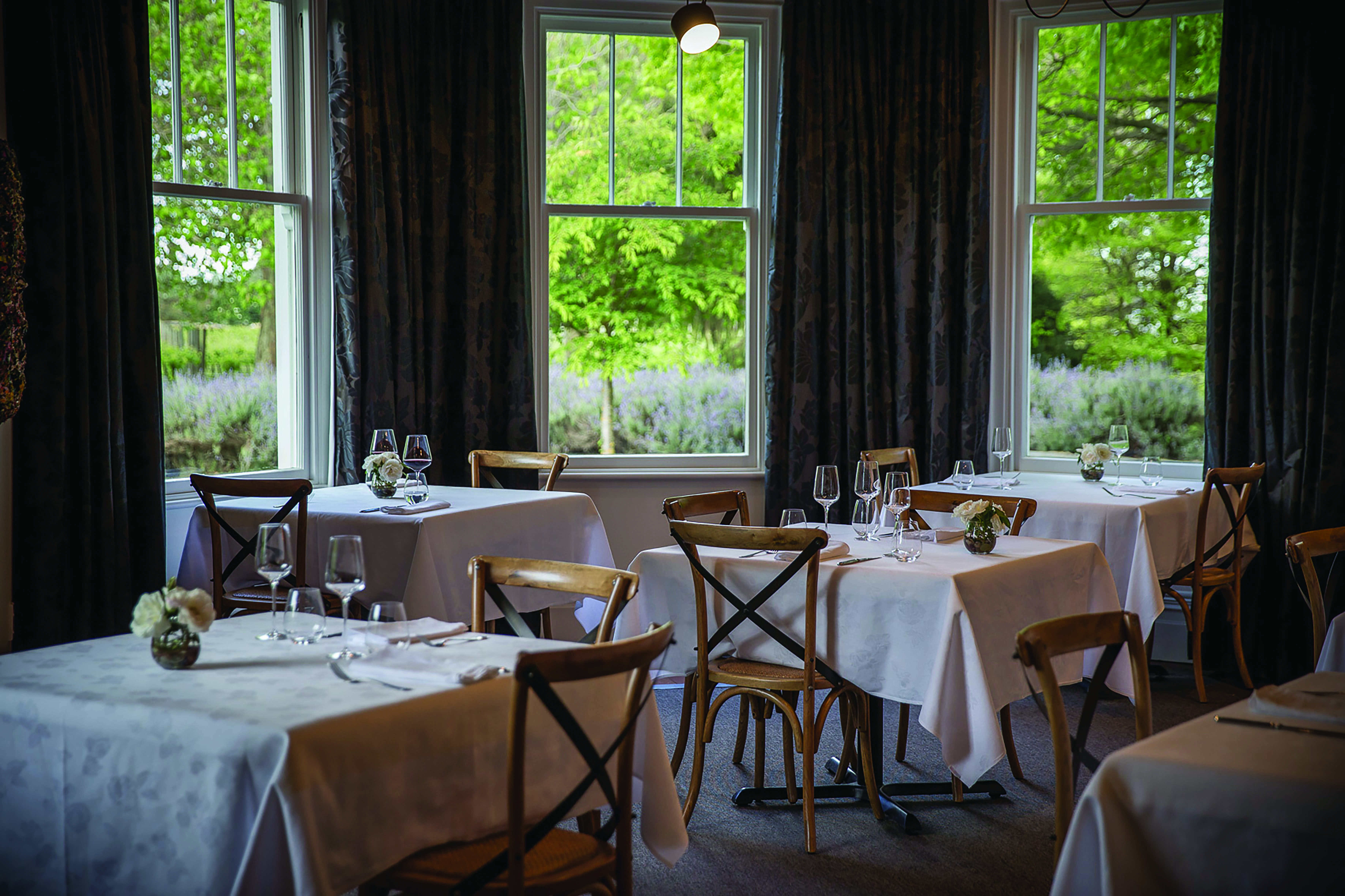 Marlborough Lodge Blenheim and Marlborough dining area with windows to gardens