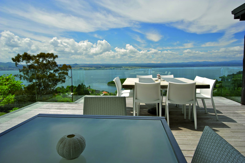 Acacia Cliffs Lodge Central North Island deck seating area with coast view