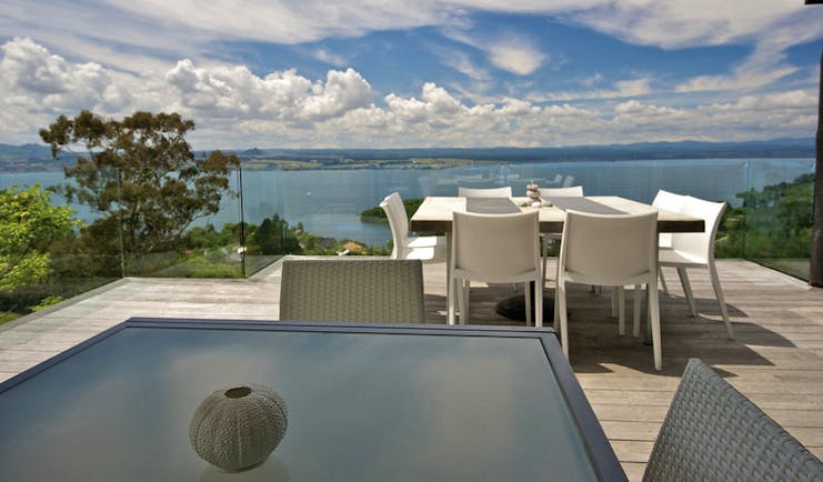 Acacia Cliffs Lodge Central North Island deck seating area with coast view