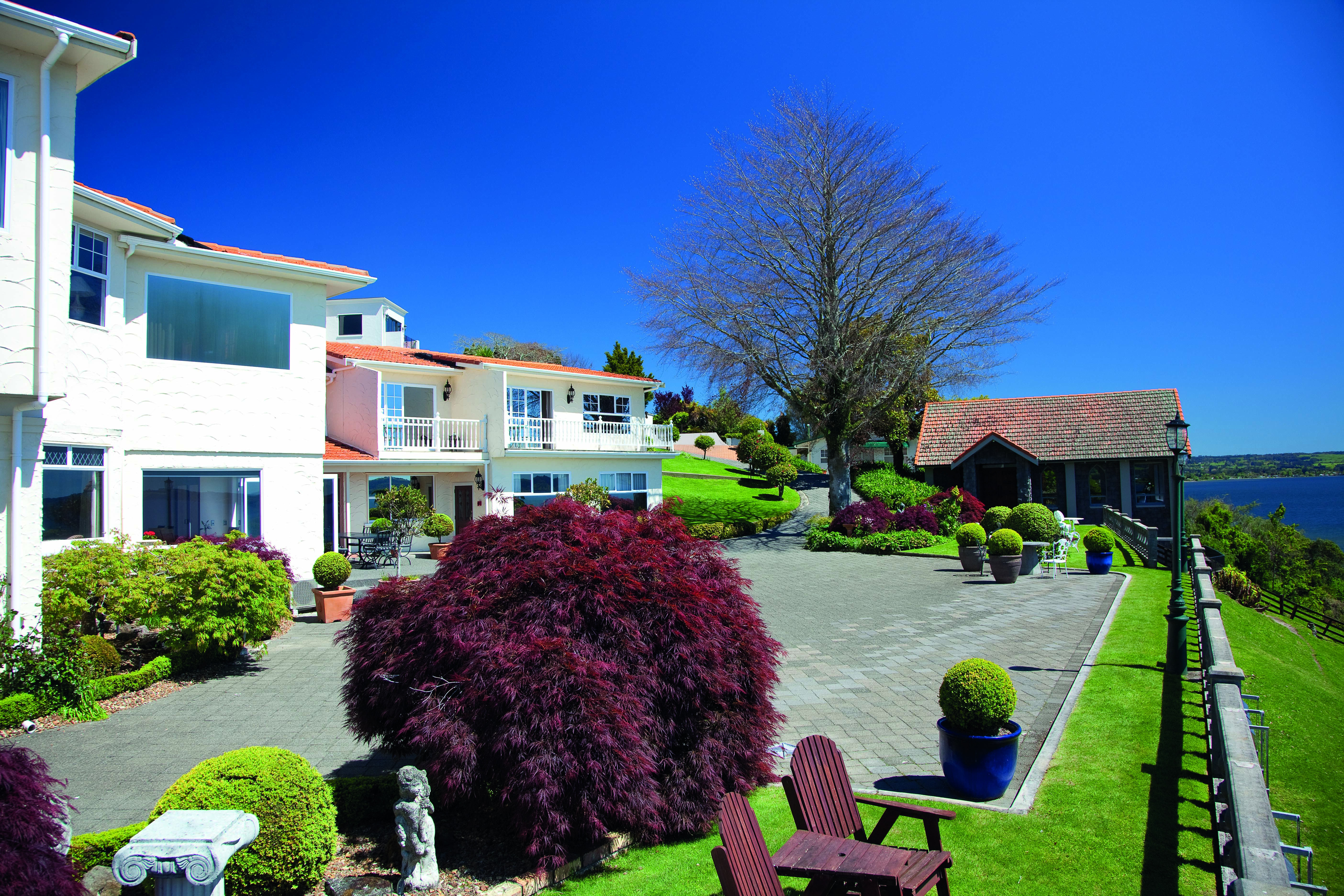 Peppers on the Point Central North Island exterior white building with gardens 
