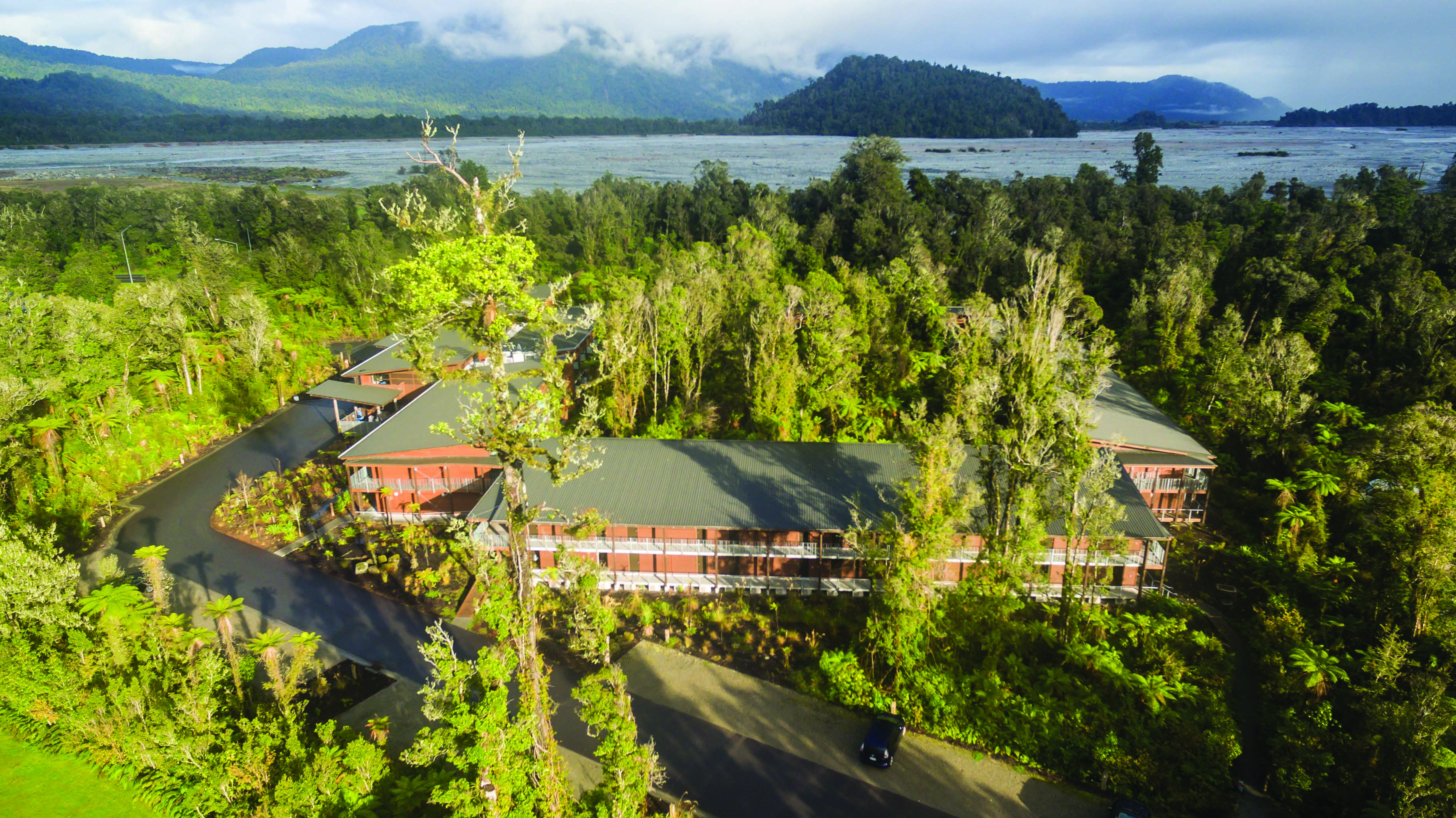Te Waonui Forest Retreat Central South Island aerial view of building surrounded by trees