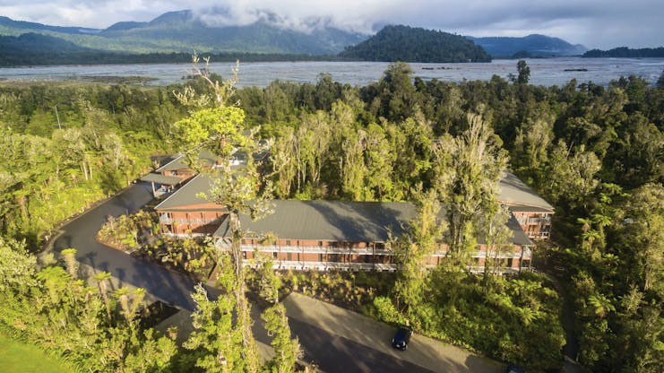 Te Waonui Forest Retreat Central South Island aerial view of building surrounded by trees