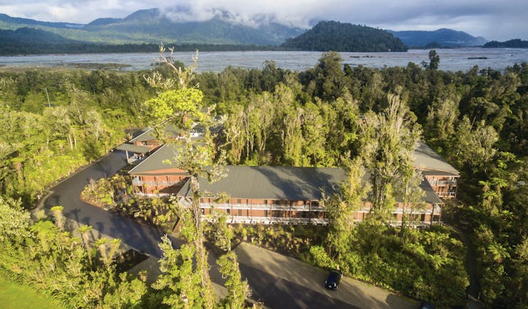 Te Waonui Forest Retreat Central South Island aerial view of building surrounded by trees