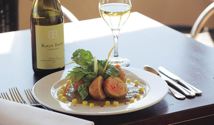 The Black Barn Hawkes Bay dining wine plate of food and Black Barn wine bottle