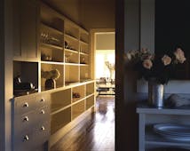 River Houses Hawkes Bay hallway with open shelving cabinets