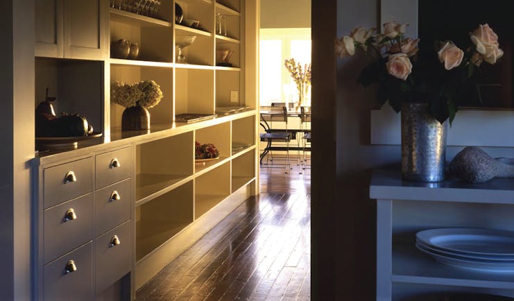 River Houses Hawkes Bay hallway with open shelving cabinets