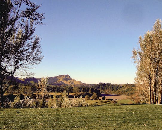 River Houses Hawkes Bay landscape overlooked by mountain