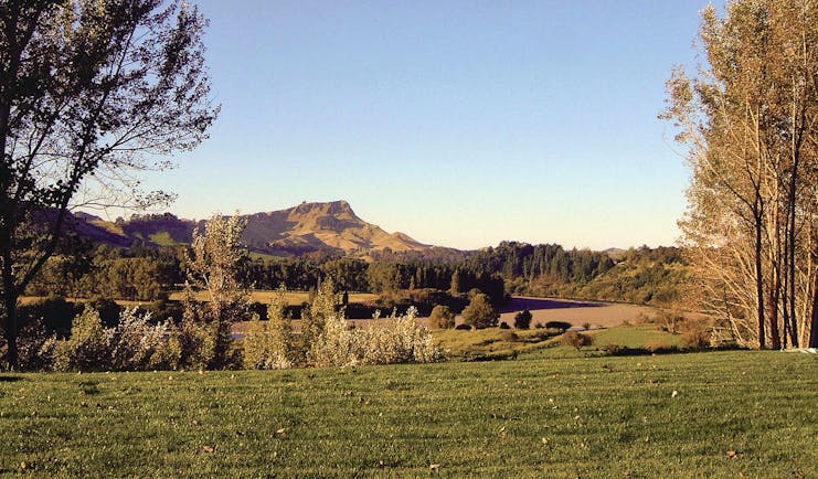 River Houses Hawkes Bay landscape overlooked by mountain