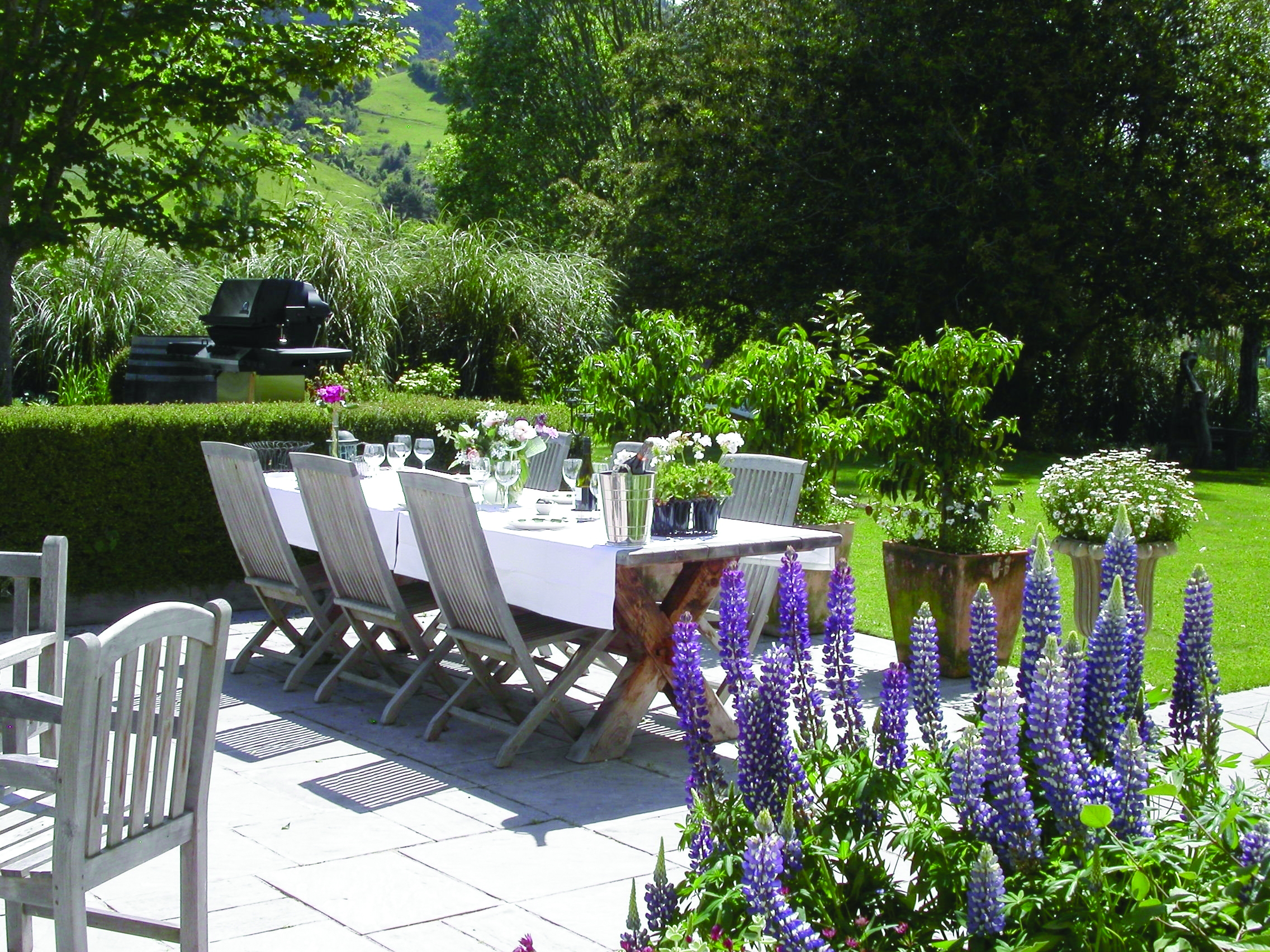 Edenhouse Luxury Lodge Nelson Abel and Tasman terrace outdoor dining area with lavender and barbecue