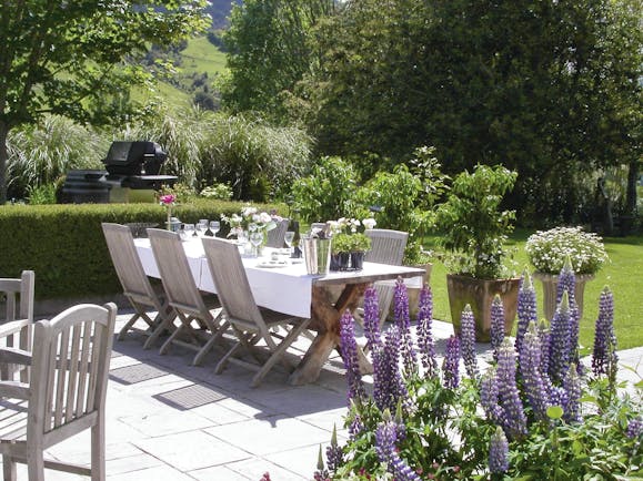 Edenhouse Luxury Lodge Nelson Abel and Tasman terrace outdoor dining area with lavender and barbecue