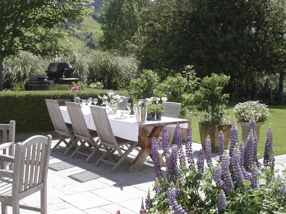 Edenhouse Luxury Lodge Nelson Abel and Tasman terrace outdoor dining area with lavender and barbecue