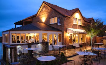 Grand Mercure Nelson Monaco Nelson Abel and Tasman exterior of building with conservatory and outdoor seating area