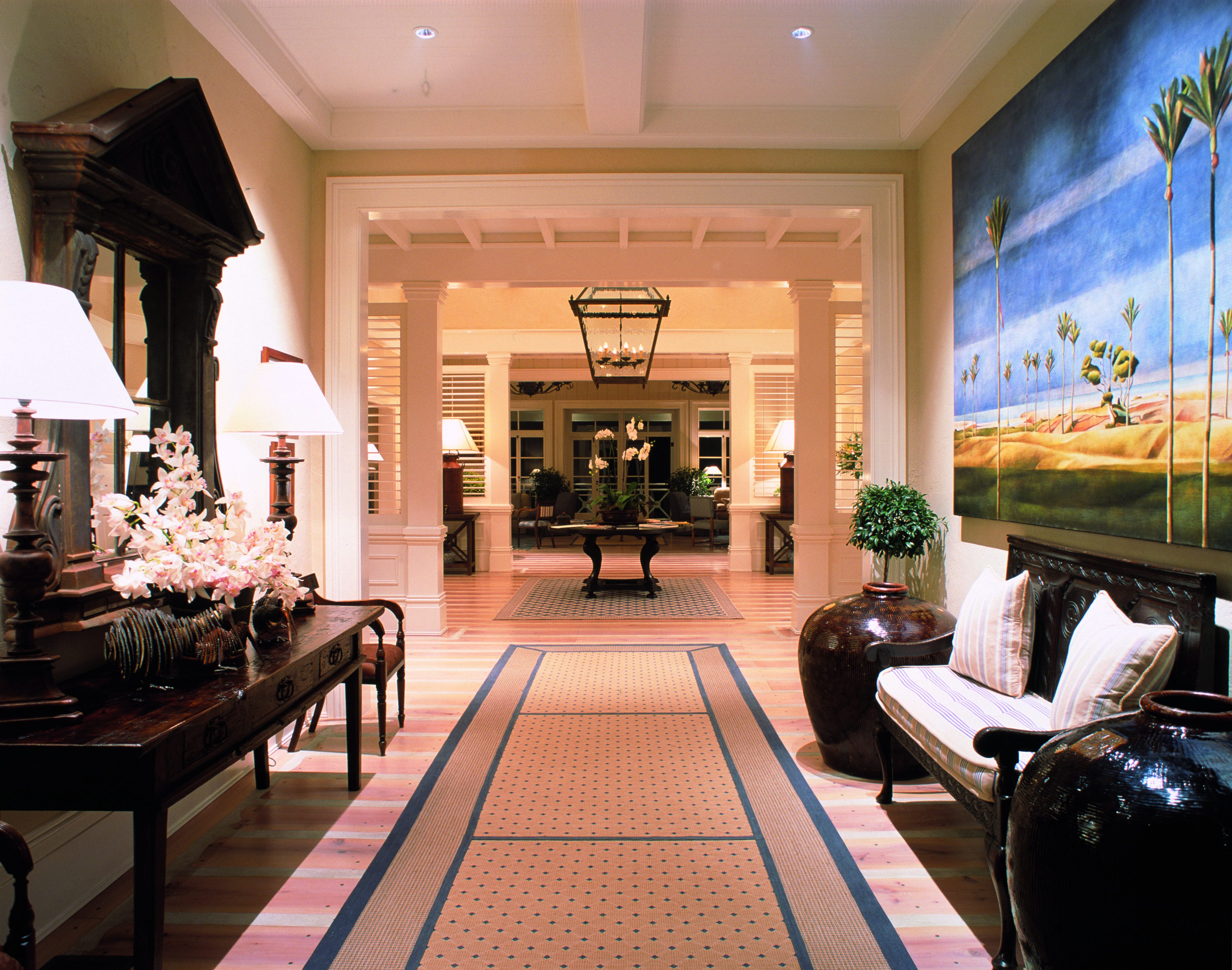 Kauri Cliffs hallway, light bright decor, antique furniture