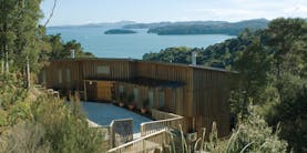 The Sanctuary at Bay of Islands Northlands and Bay of Islands exterior wooden buildings surrounded by trees near coast