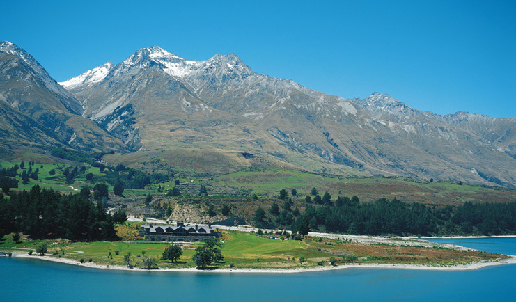 Blanket Bay Otago and Fiordland mountain lake lodge surrounded by lawns near lake and mountains