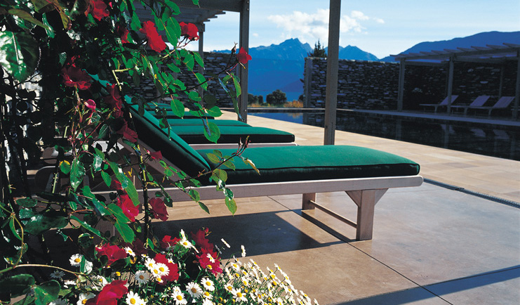 Blanket Bay Otago and Fiordland outdoor pool and green sun loungers