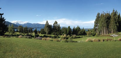 Dock Bay Lodge Otago and Fiordland view gardens with trees and mountain view
