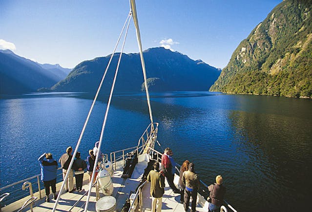 View from ship looking over water and mountains 