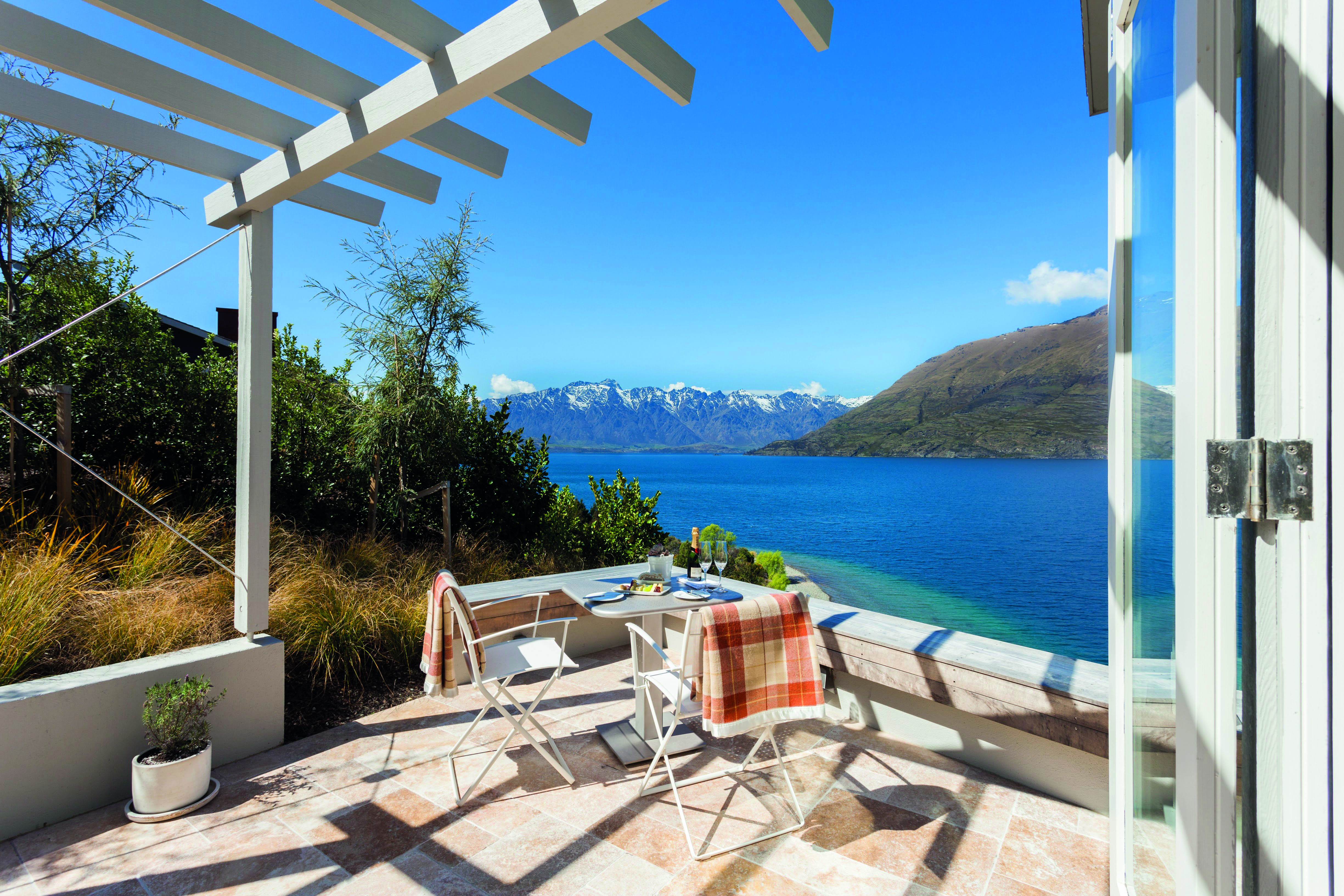 Matakauri Lodge Otago and Fiordland deluxe suite private terrace with mountain and lake view