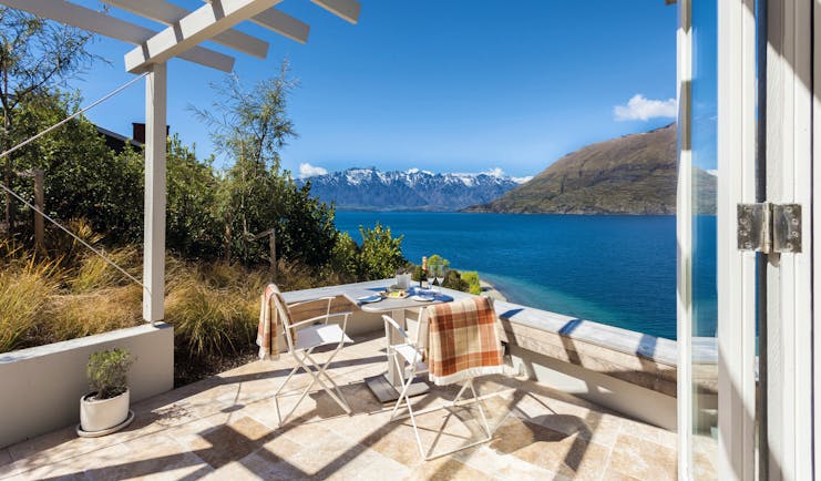 Matakauri Lodge Otago and Fiordland deluxe suite private terrace with mountain and lake view