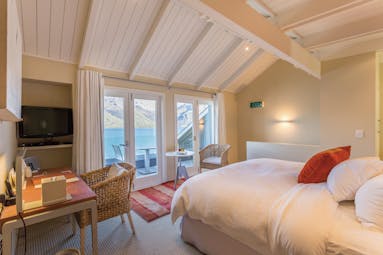 Matakauri Lodge Otago and Fiordland Matakauri bedroom with access to balcony with mountain view