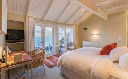 Matakauri Lodge Otago and Fiordland Matakauri bedroom with access to balcony with mountain view