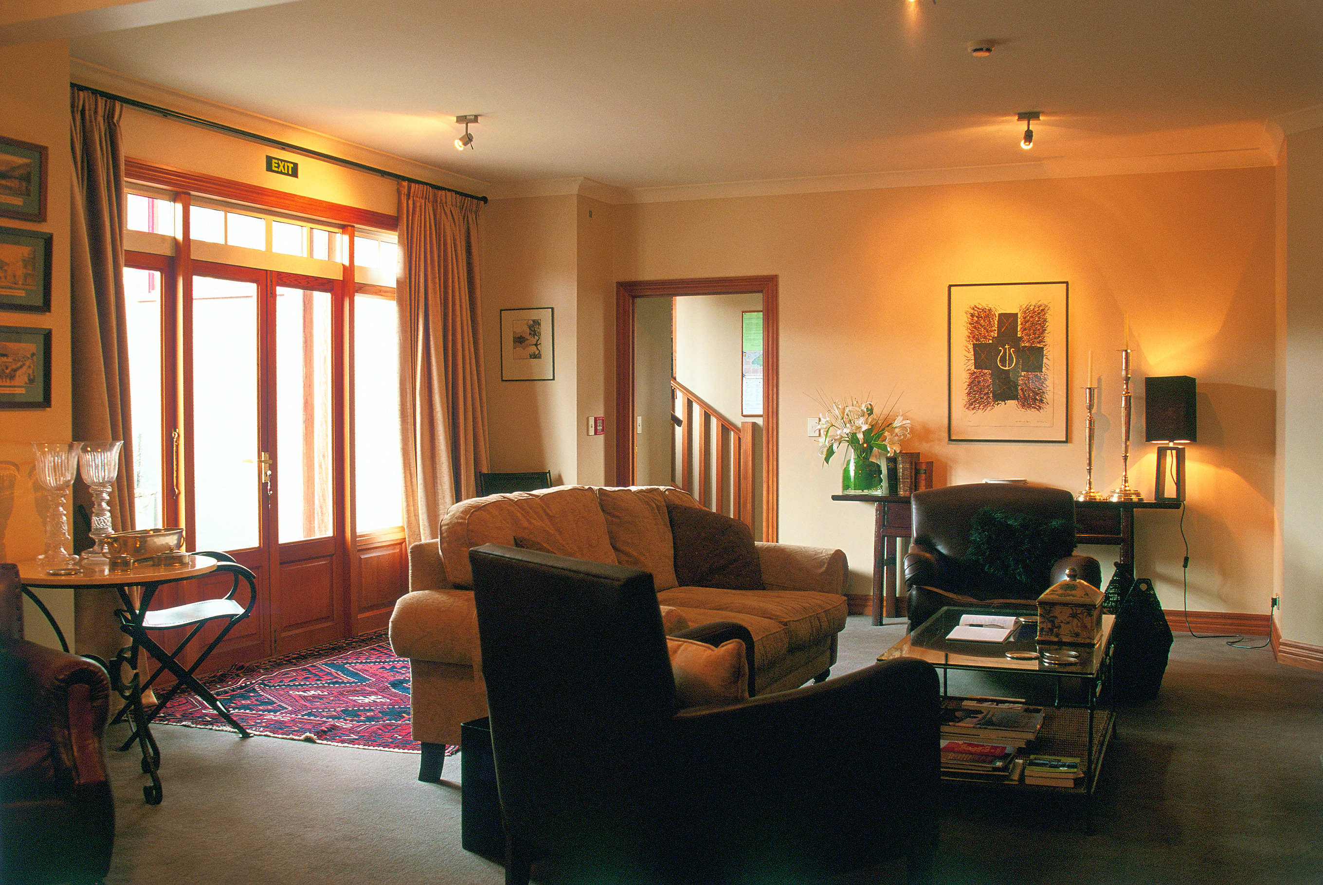 Lounge at The Dairy with arm chairs and sofas around the room