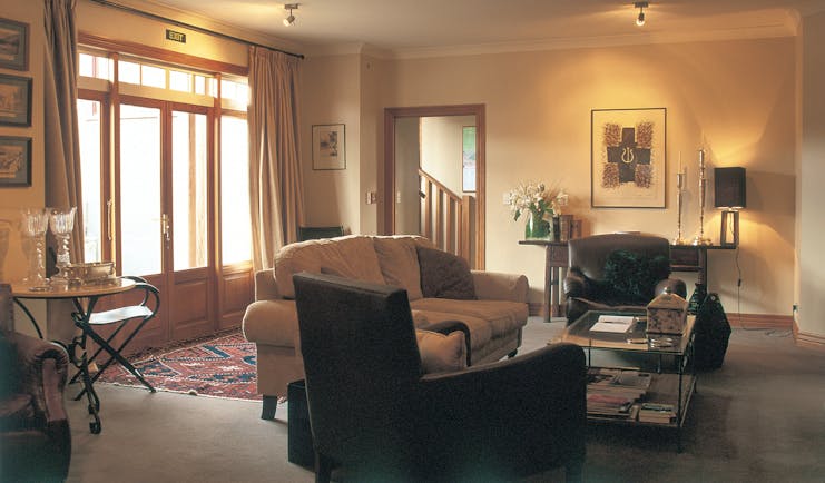 Lounge at The Dairy with arm chairs and sofas around the room