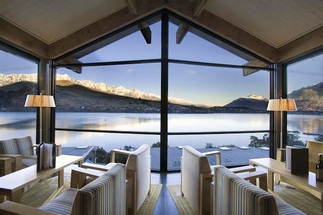 The Rees Hotel Otago and Fiordland mountain view lounge area with panoramic windows