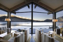 The Rees Hotel Otago and Fiordland mountain view lounge area with panoramic windows