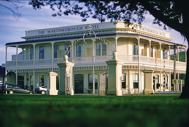 Martinborough Hotel exterior of a large cream building with balcony surrounding it 