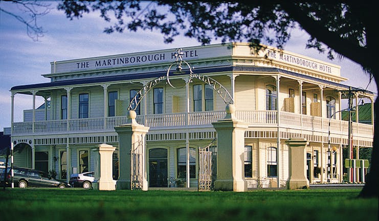 Martinborough Hotel exterior of a large cream building with balcony surrounding it 