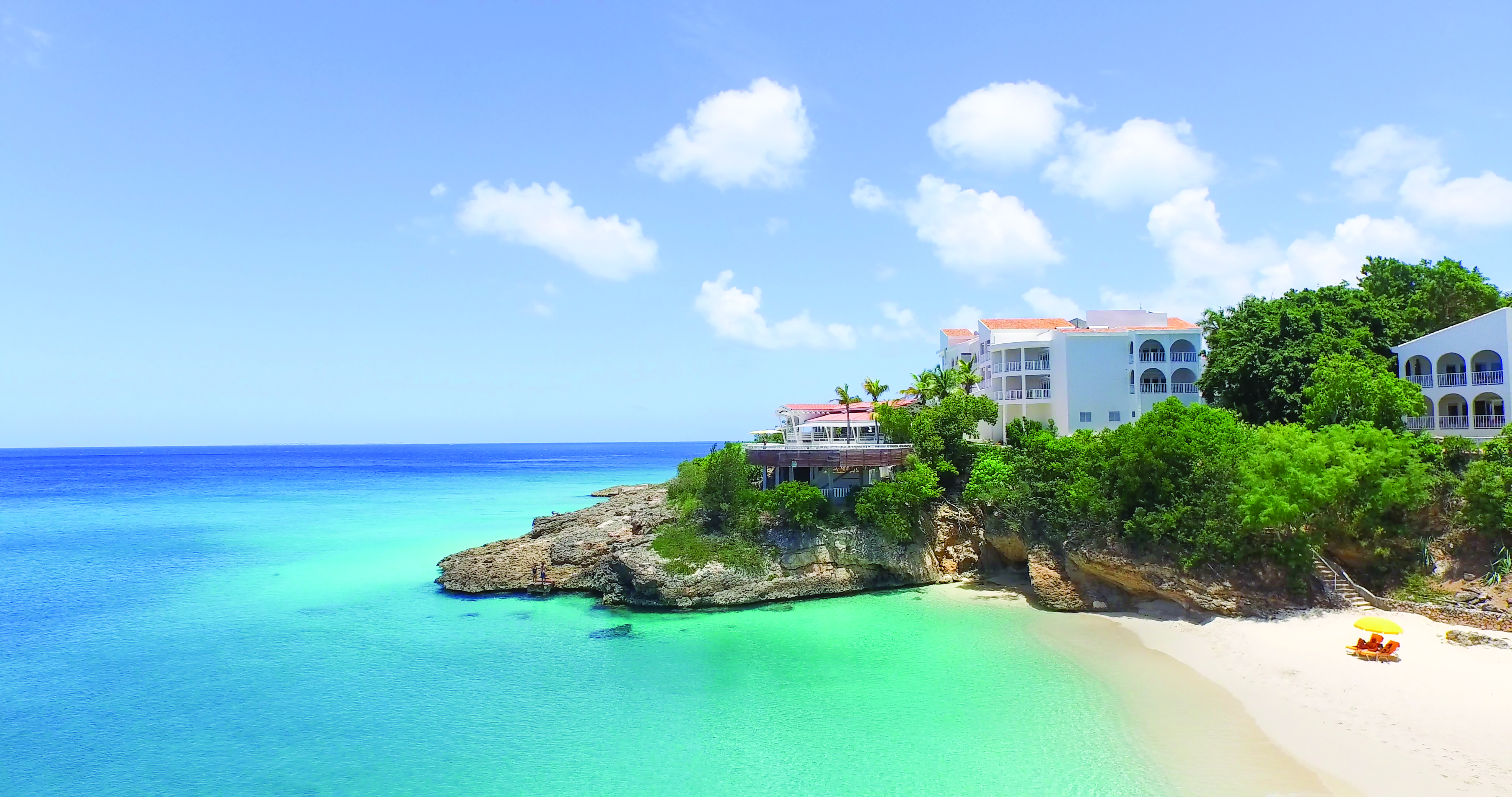 Malliouhana overview showing the hotel next to the beach and sea