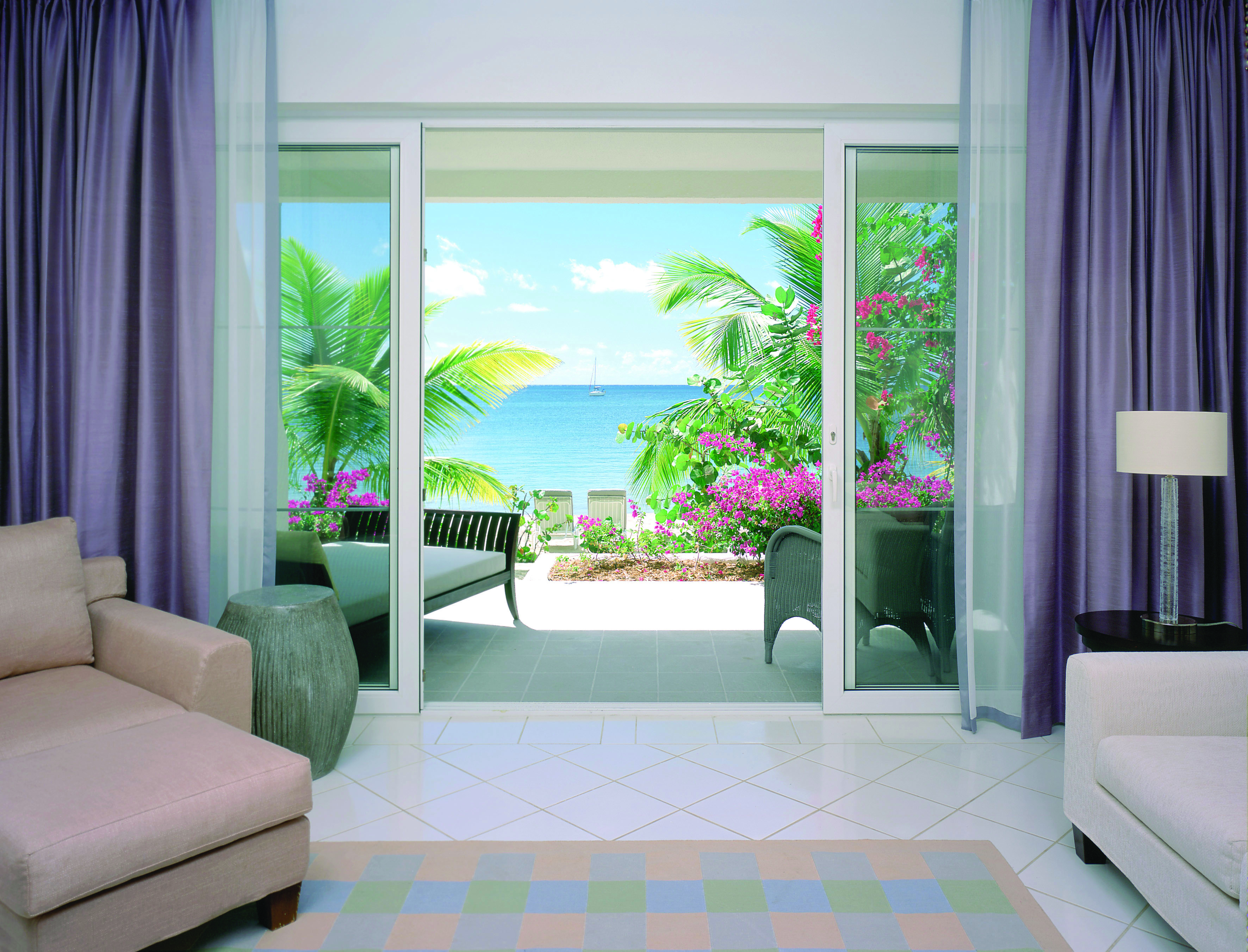 Carlisle Bay Antigua beach suite terrace sun loungers and ocean view