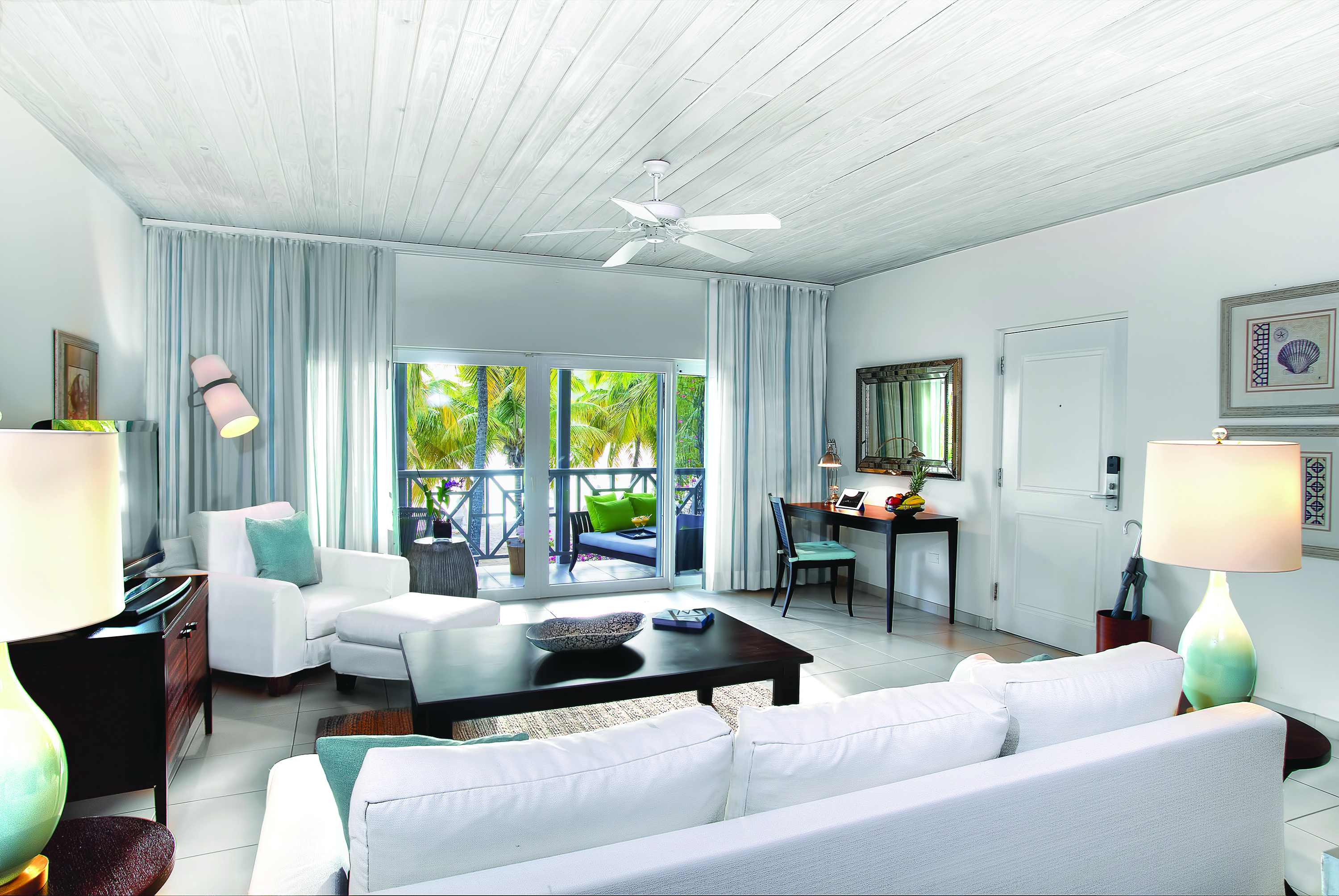 Carlisle Bay Antigua ocean suite living area with balcony