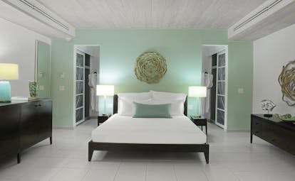 Carlisle Bay Antigua ocean suite bedroom with walk in wardrobes