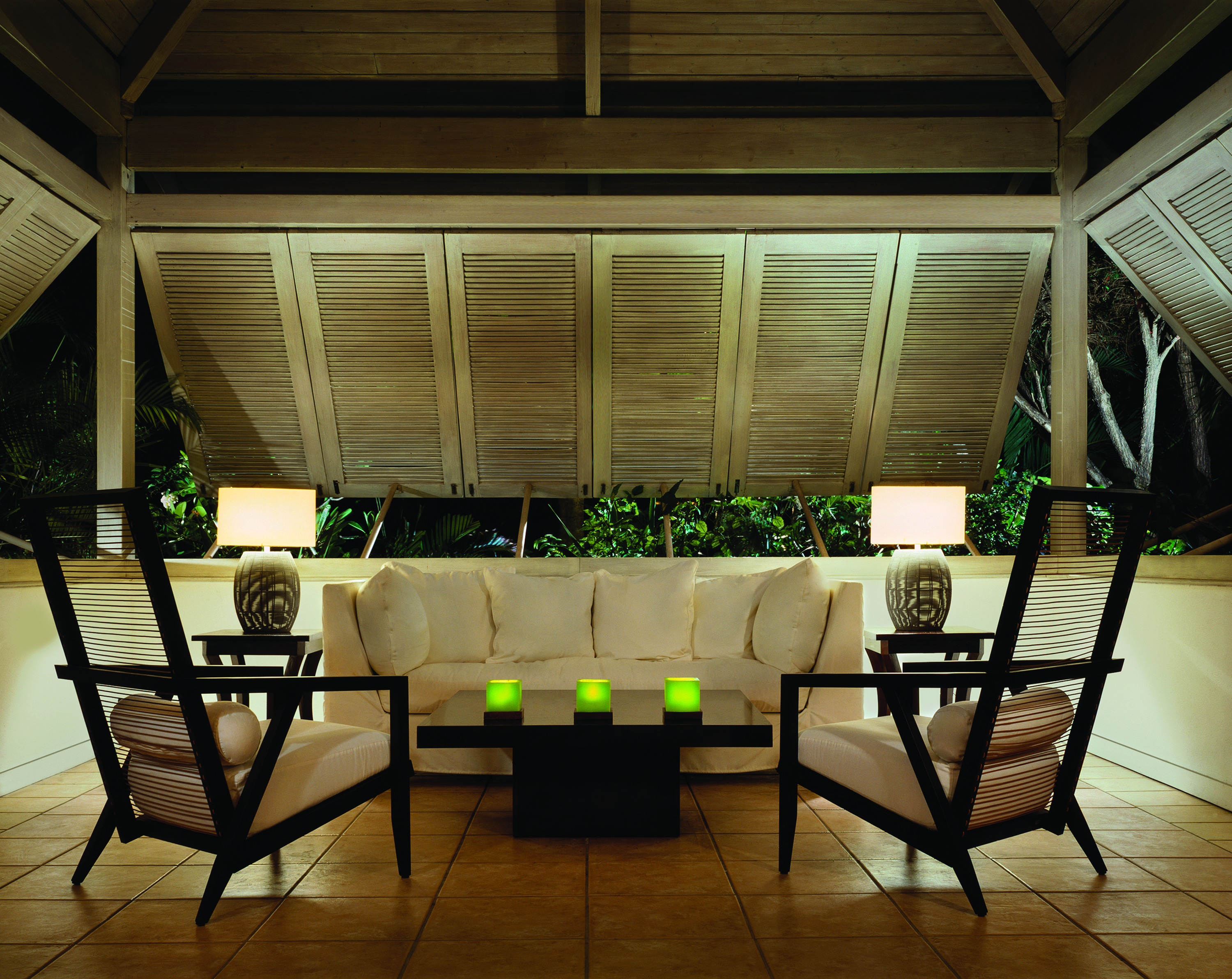 Carlisle Bay Antigua pavilion bar indoor seating area sofa and armchairs