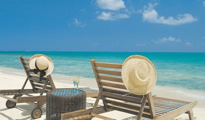 Galley Bay Antigua beach chairs white sand clear blue sea