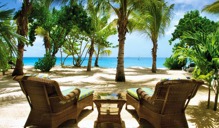 Galley Bay Antigua sun loungers overlooking ocean palm trees