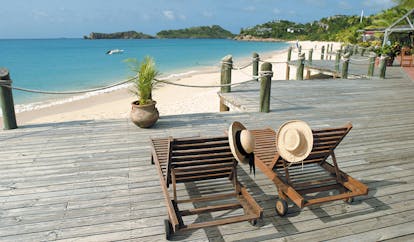 Galley Bay Antigua beach terrace loungers overlooking beach coastline in distance