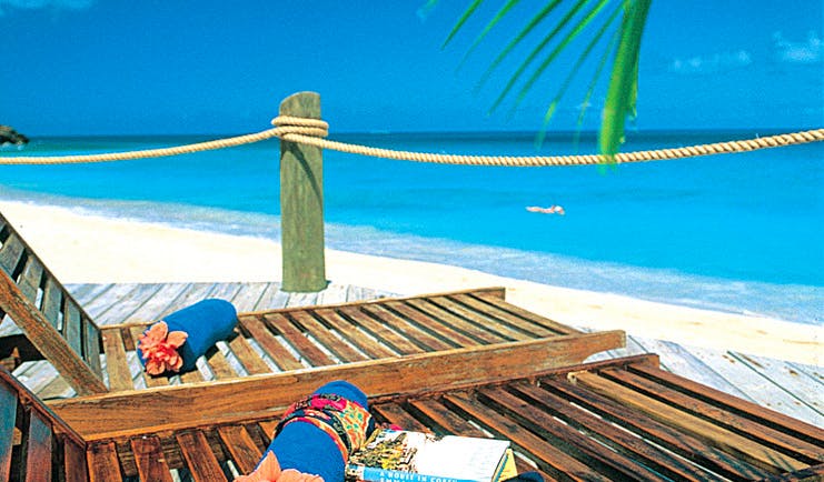 Galley Bay Antigua beach terrace sun loungers overlooking sea