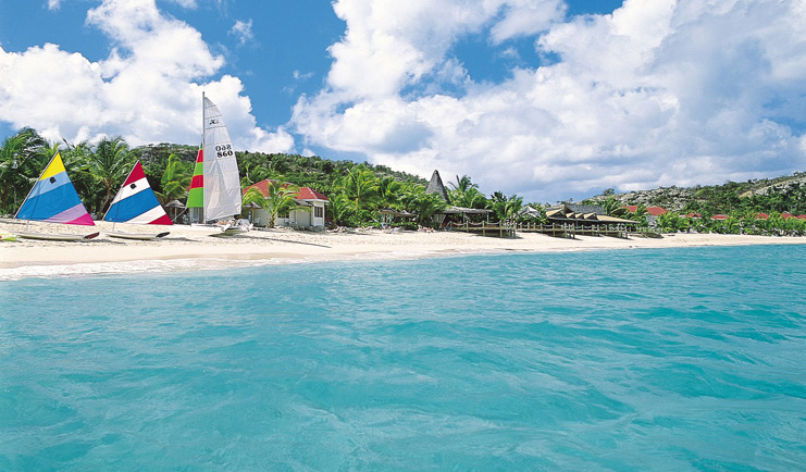 Galley Bay Antigua boats moored on beach clear blue sea white sand