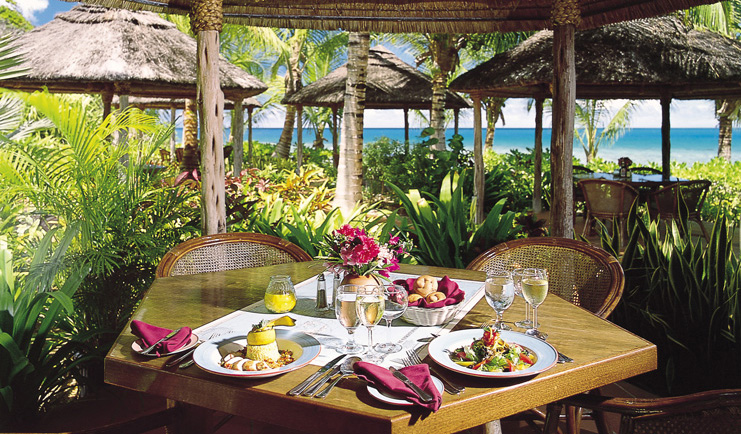 Galley Bay Antigua gauguin restaurant interior food on table surrounded by greenery
