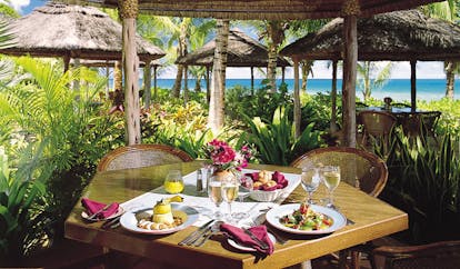 Galley Bay Antigua gauguin restaurant interior food on table surrounded by greenery
